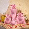 Pouch like linen with printing 15 x 20 cm - natural / red trellis Printed organza bags