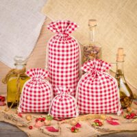 Pouch like linen with printing 15 x 20 cm - natural / red trellis Printed organza bags